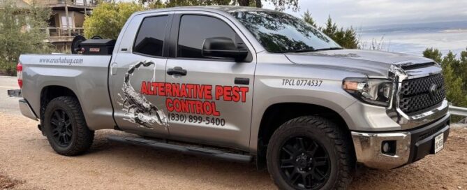 Professional pest control service truck serving Canyon Lake and Fischer, TX since 1996.