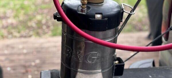 Professional glue board and handheld sprayer used for family-safe scorpion control in Canyon Lake.